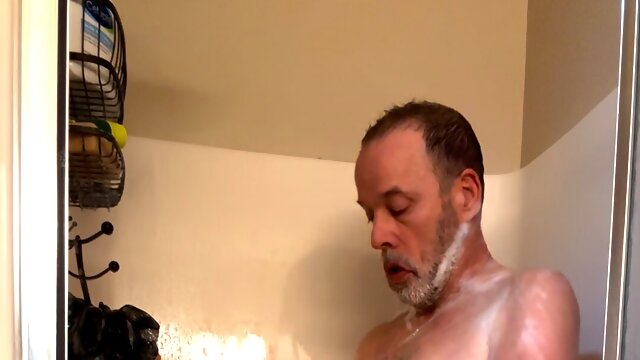 Daddy showers - gets erect - plays