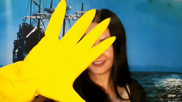 Yellow rubber gloves for fisting. Do you want to feel them in yourself? Dominatrix Nika and glove fetish.