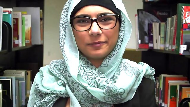 Watch Mia Khalifa flaunt her perfect body in public library - solo orgasm!