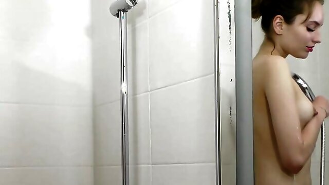 Sweet brunette Vika Lita passionately masturbates in the bathroom in 4K.