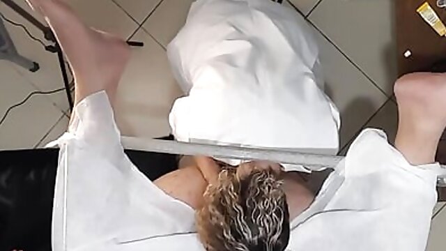 Urologist doctor gets horny during a prostate exam and ends up fucking the patient with her strapon