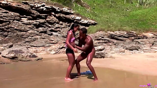 A Tanned Brunette Takes a Black Guy to the Beach to Bang Her Tight Pussy