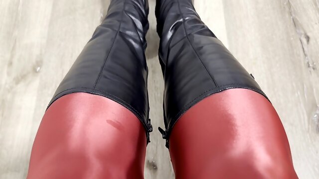 I unexplosion a giant load of while wearing a black skirt, red nylon tights and high black leather boots