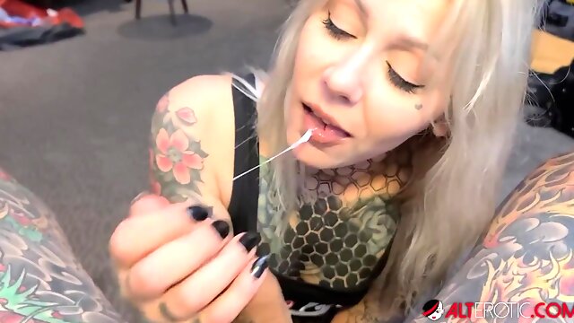 Inked blonde Nayomi Sharp is giving an insane blowjob to a lucky guy