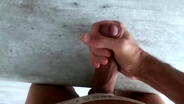 Masturbation of a big dick 18 cm on a table top