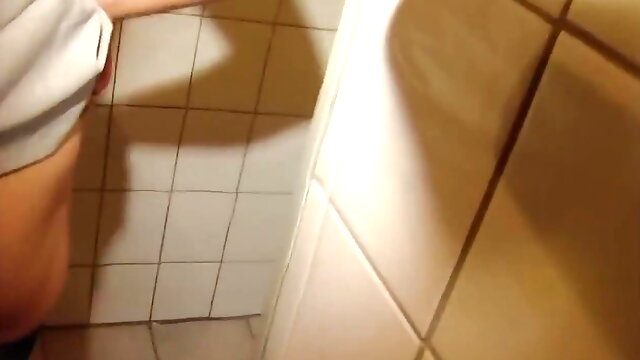 Cute Brunette Blows a Hot Cock on the Toilet