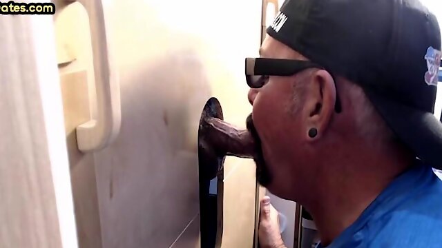 Inked gaydaddy amateur sucks gloryhole cock till facial