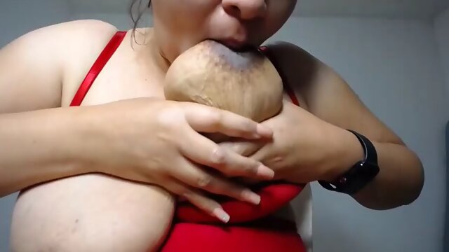 Nice set of lactating tits with dark areolas and nipples getting squeezed and sucked