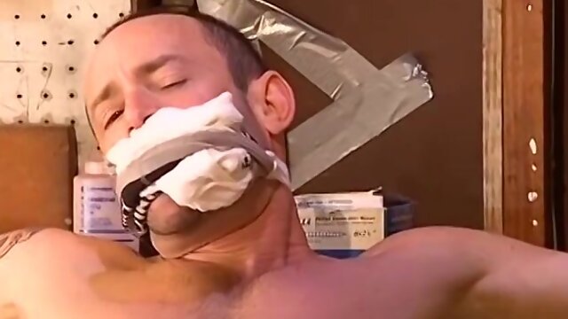 Kinky mechanic Derek da Silva continues to torment and chained the hunk