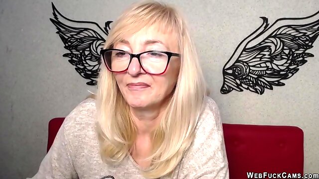 Blonde MILF with glasses on webcam