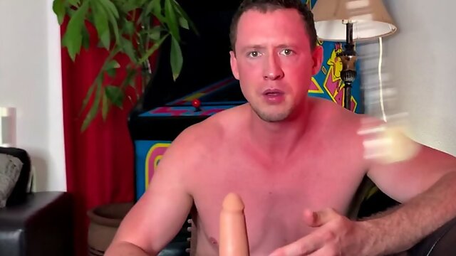 Nympho mature guy in red underwear sucks his dildo toy