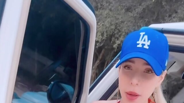 Busty Latina Bimbo fucks her ass and pussy in her car with a big dildo