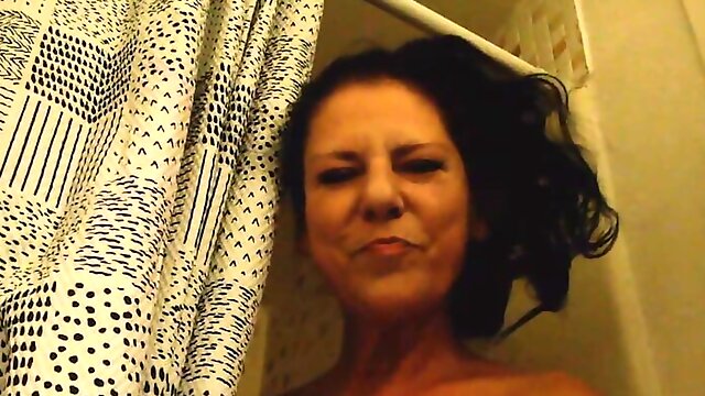 Naughty Naked Milf Showering and Masturbating