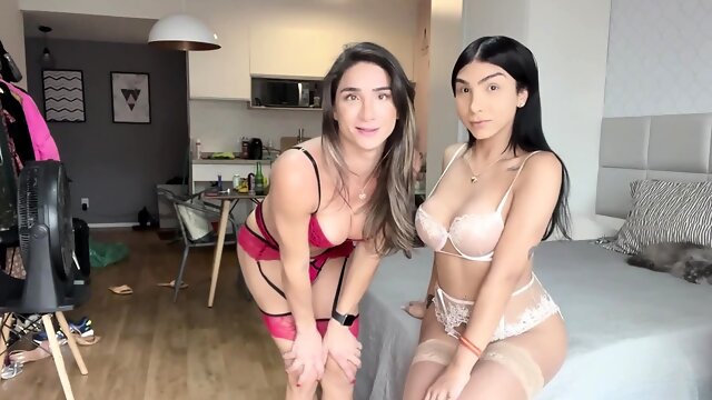 StrapOn Two hot brunette lesbians fucking each other