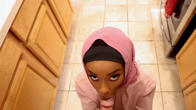 Cute ebony is wearing a hijab and feasting on a BWC