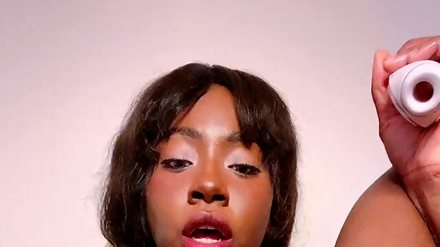 Busty ebony bitch needs to squirt using a toy