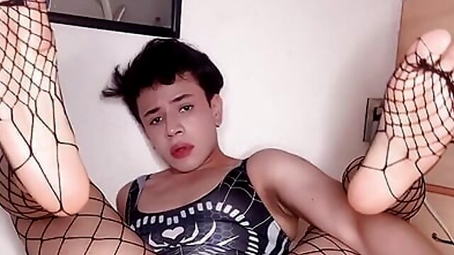 Slutty teen femboy fucks his ass in fishnets