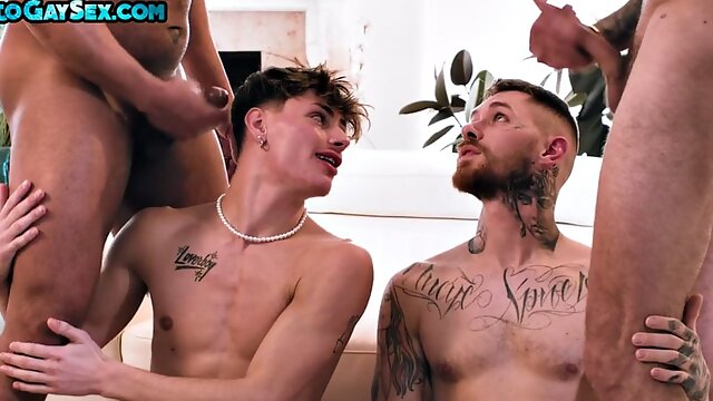Tattooed anal stud and twink barebacked in orgy for facial