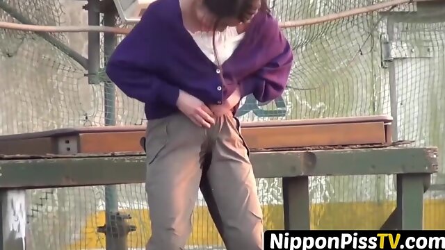 NipponPissTV.com - Asian [censored] filmed pissing herself in public openly