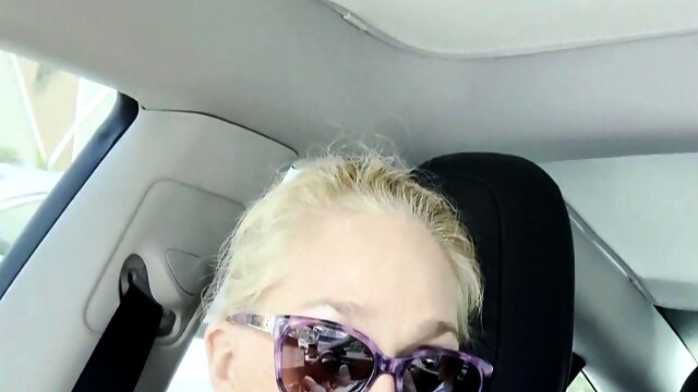 Close up homemade video of blonde Wendy having fun in a car