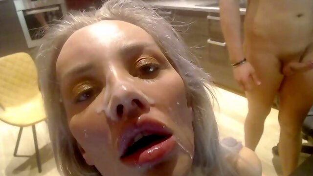 Blonde slut gets facial in kitchen