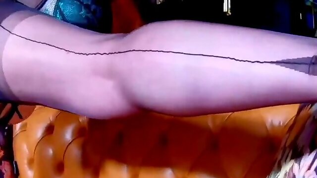 Red XXX stuffs her pussy with a big black dildo