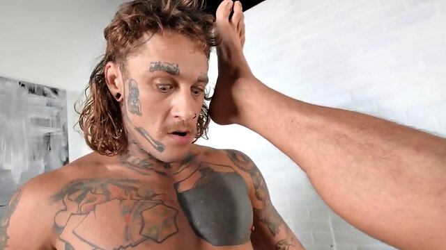 Dominant jock with tattoos barebacks businessman