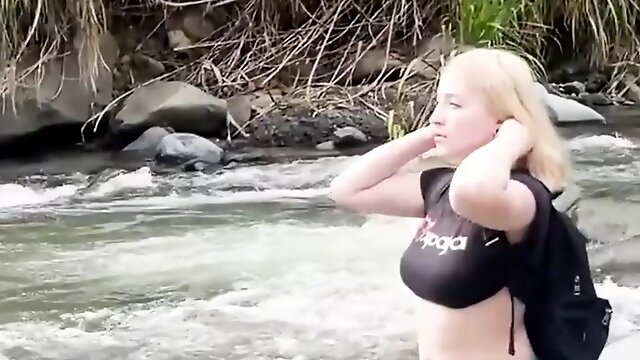 BEAUTIFUL BLONDE IS DISCOVERED NUDE TOUCHING HERSELF IN THE RIVER