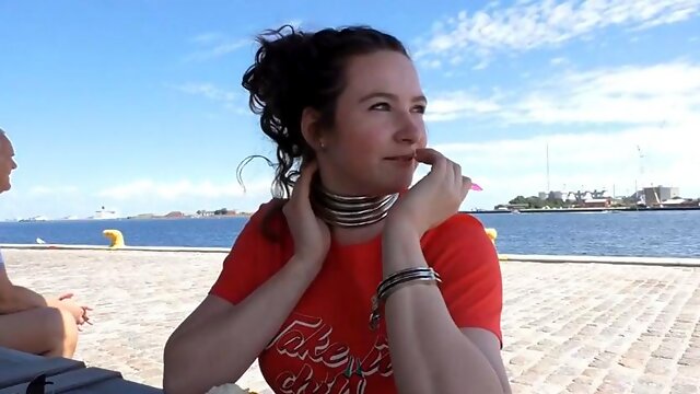 Tourist Wears Collar and Leash While Sightseeing