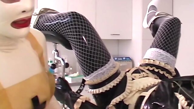 Girls in latex are doing some naughty stuff in bizzare video