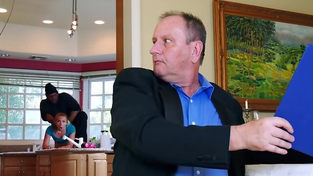 Blonde MILF fucked by black burglar behind husbands back