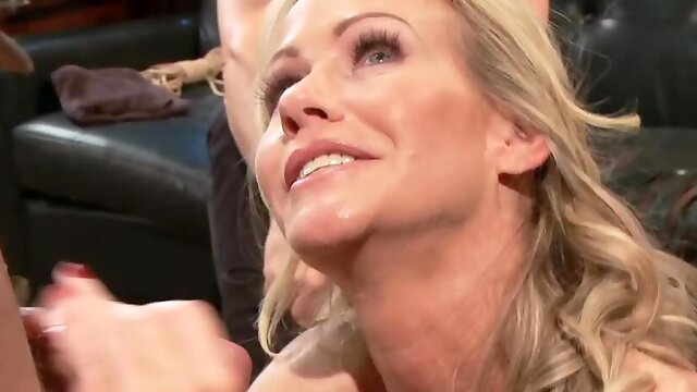 Bound blonde slavegirl is giving a blowjob to her master