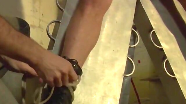 Chad Brock is bound naked on the cross for a bonus session with kinky Master Derek