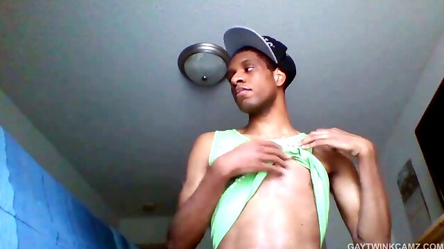 Black amateur twink gets off while showcasing his big hard-on on webcam