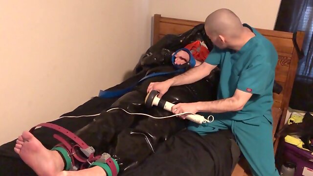 Gay domination session with leather, breath control, and latex play
