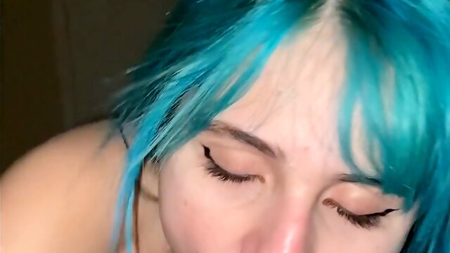 Chick with blue hair gives sloppy blowjob to hung ebony stud while moaning