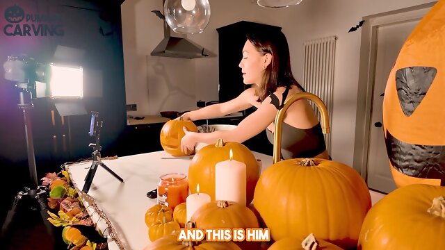 Naked pumpkin carving session for Halloween