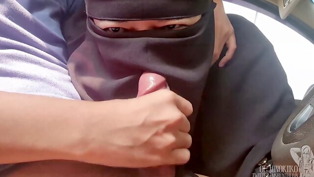 Hot amateur wife gives blowjob in car wearing a black hijab