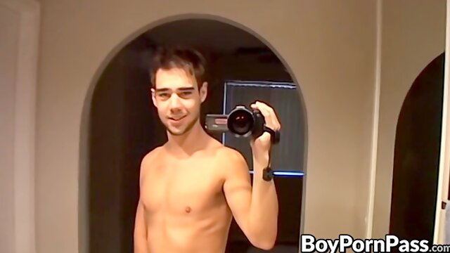 Young hunk Zack Randall strokes his big cock in the shower