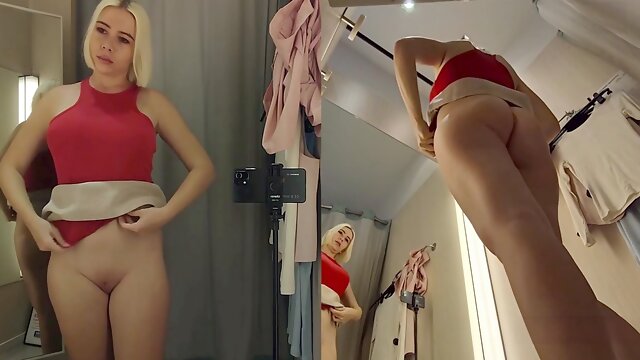 Hot blonde babe MyCandyAlice tries on sheer outfits, flaunting her big tits in public