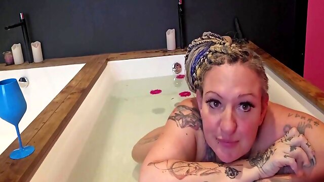 Horny mature mom pleasures herself in the bathtub