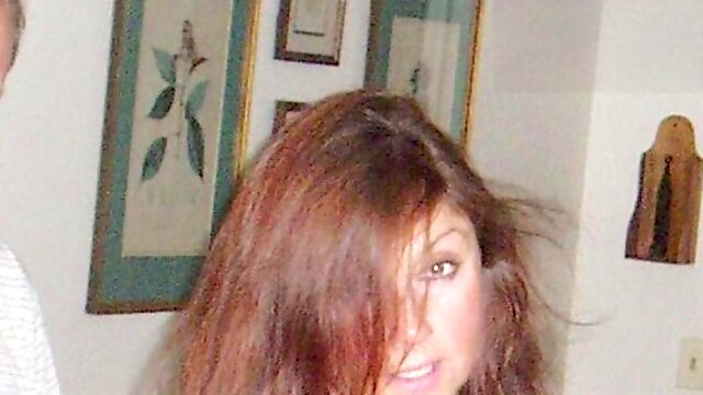 Stunning businesswoman Candi Annie comes home to a wild on-camera sex session