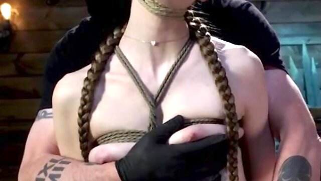 Bound babe electrically stimulated in suspension