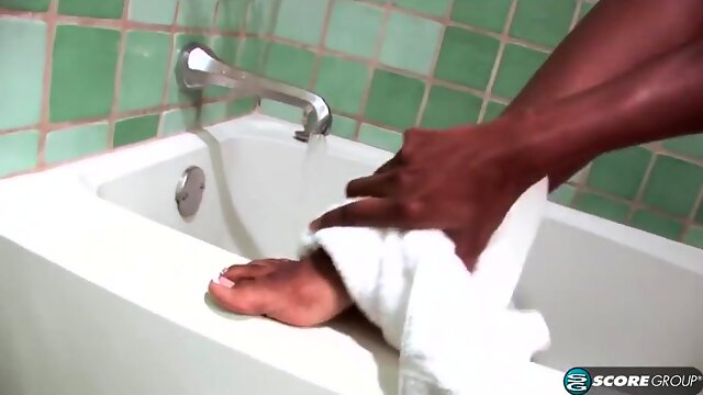 Bare legs in the bath