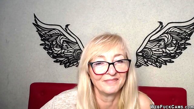Blonde amateur MILF IngritSno with glasses on webcam