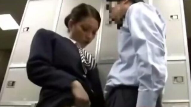 Japanese Flight Attendant Making Her Rounds