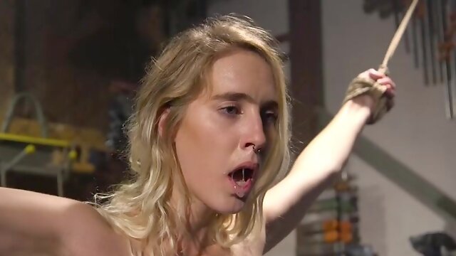 Tied up blonde double flogged