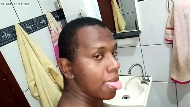 Naughty doll getting picked up in the shower