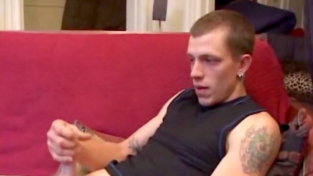 Proud of his rigid cock, Shane kicks back and starts stroking. Stimulated by porn video, things get pretty busy, but all cums out in the end.