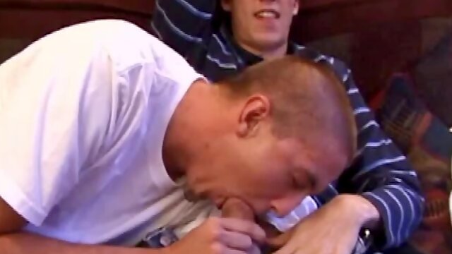 While watching a porn video, Matthew Matters works up a stiff one and Rod Filler goes down on the monster. In return, Matthew swallows Ros hard cock and a face fucking exchange follows.